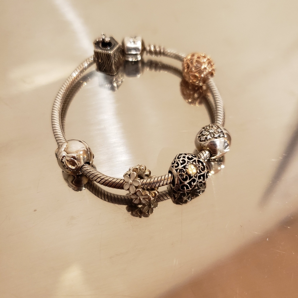 *Authentic* Pandora bracelet with *Pandora* charms